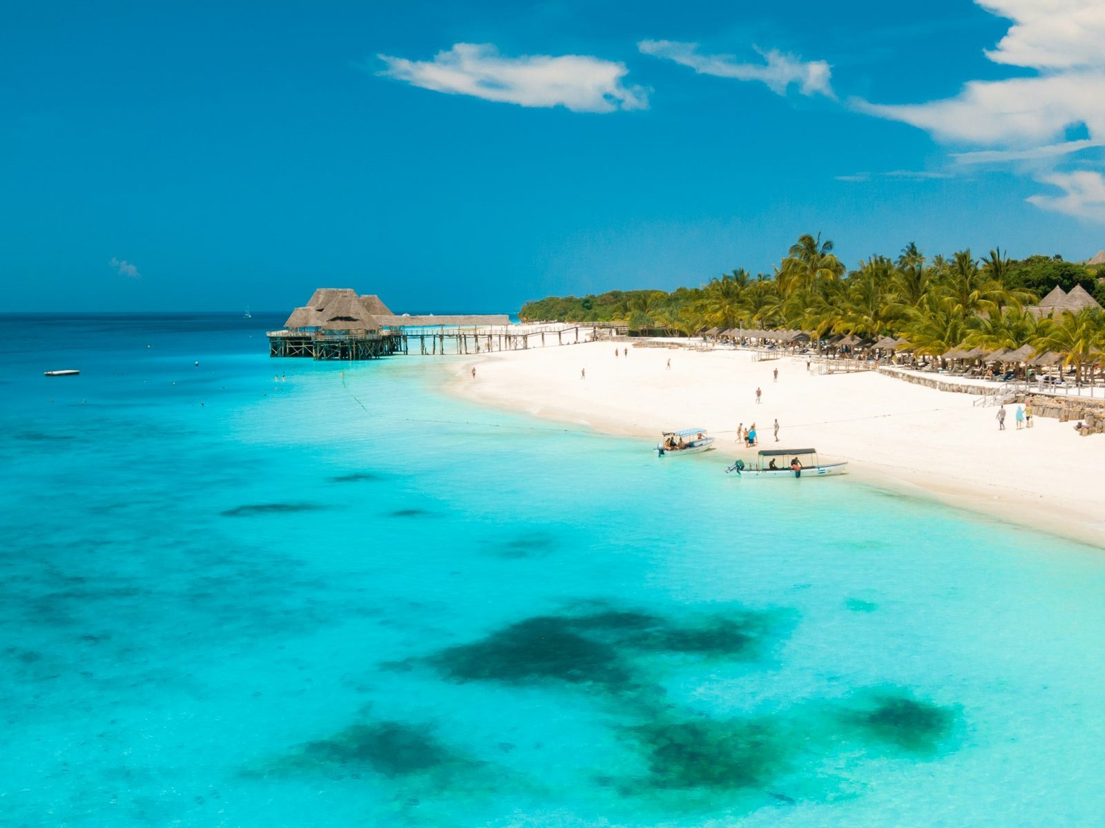 A turquoise Zanzibar beach with white sand and clear Indian Ocean water